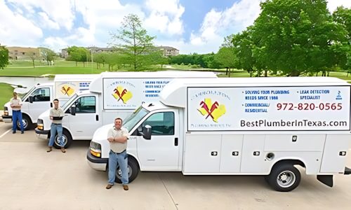 Carrollton Plumbing Service team and branded service trucks in Carrollton, TX
